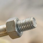 Closeup of threaded rod for machine